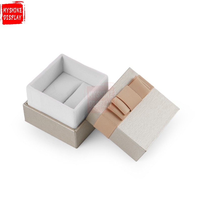 Champagne colour paper jewellery packing box with ribbon bowknot