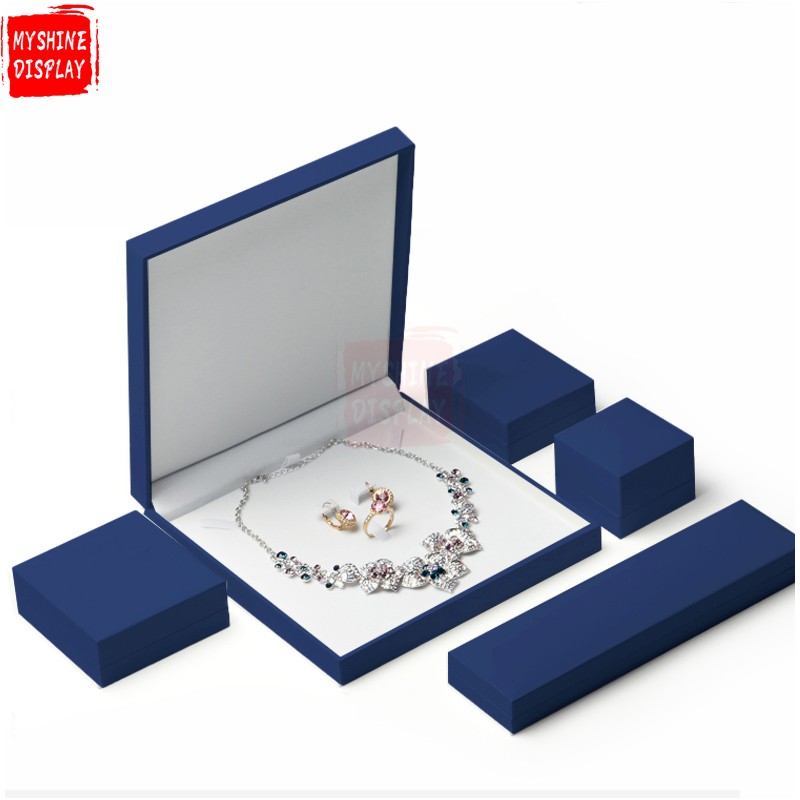 Custom logo blue jewelry packaging box with white velvet inside